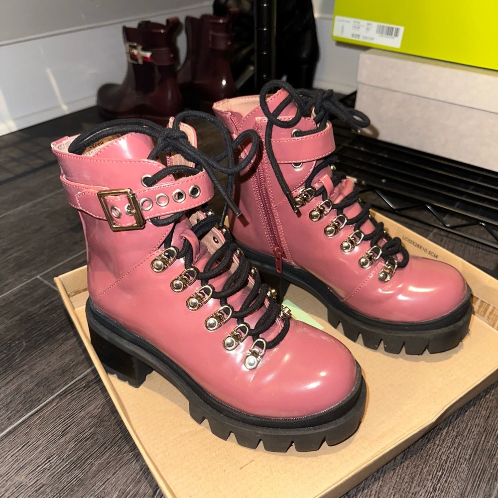 Lace up pink boots with a zipper